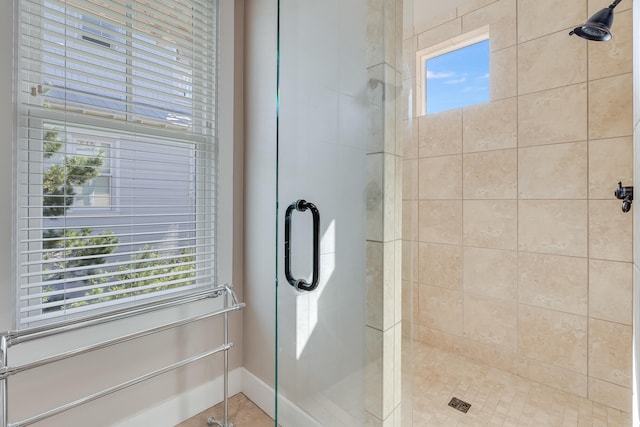 bathroom featuring a stall shower