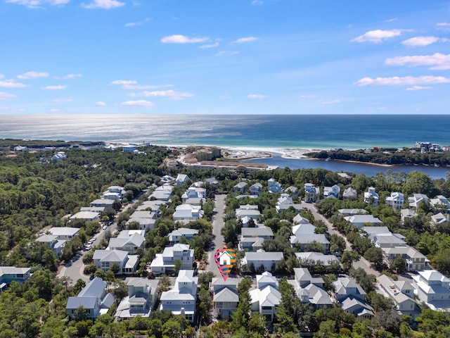 birds eye view of property with a residential view and a water view