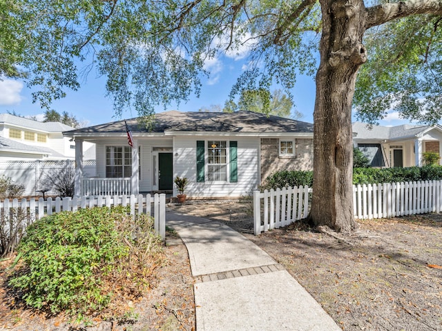 ranch-style home featuring covered porch