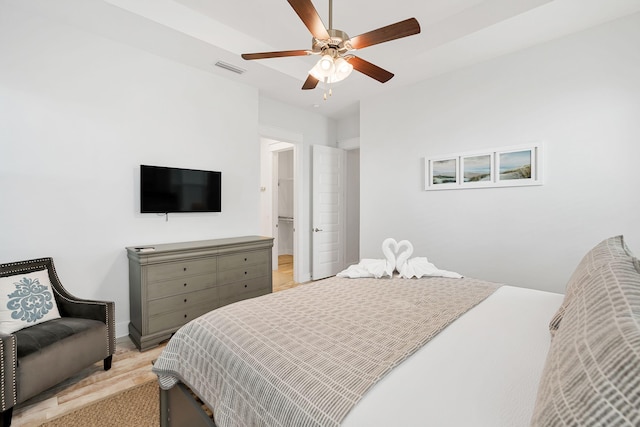 bedroom featuring visible vents and ceiling fan