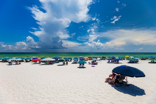 property view of water featuring a beach view