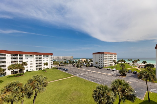 birds eye view of property with a water view