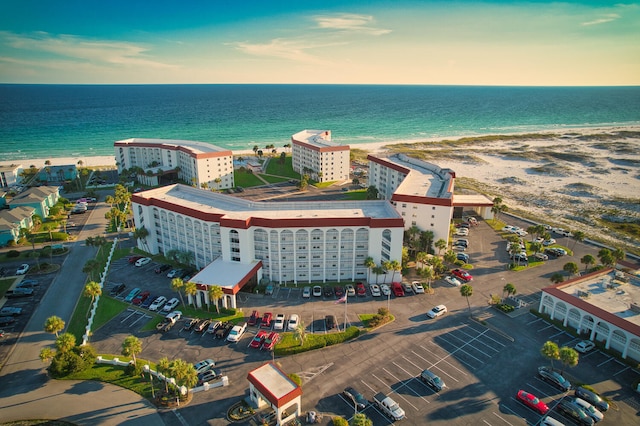 bird's eye view featuring a view of city, a water view, and a view of the beach