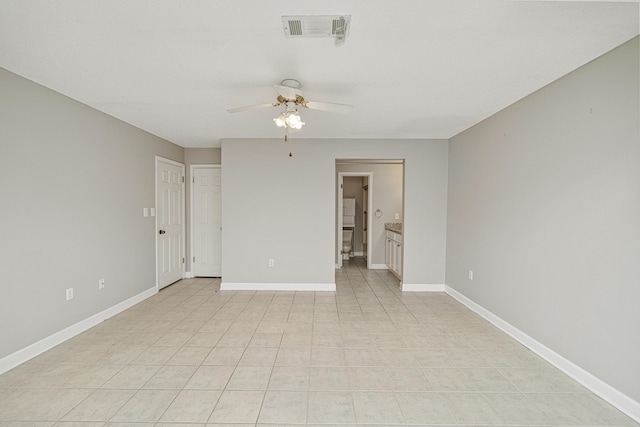 303 Southlake Ct Unit 303, Niceville, FL 32578 - empty room featuring ceiling fan and baseboards