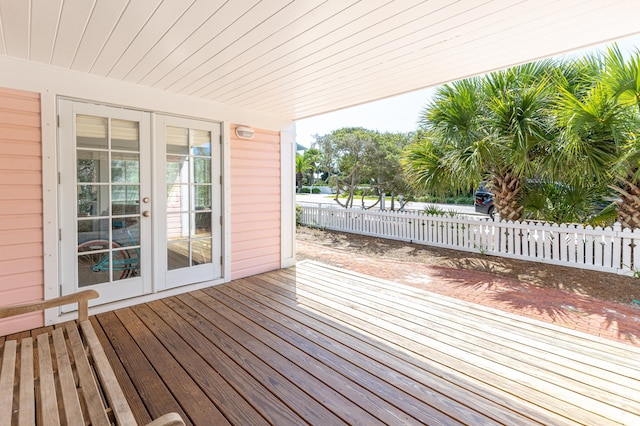 wooden deck featuring fence