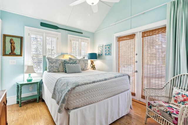 bedroom featuring lofted ceiling, ceiling fan, light wood-style flooring, baseboards, and access to exterior