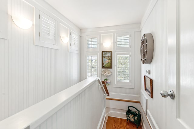 stairs with wood finished floors