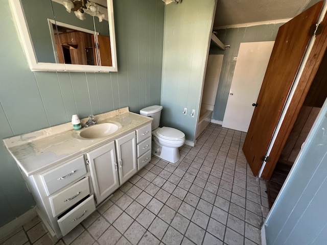 full bath with toilet, tile patterned floors, shower / bathing tub combination, and vanity