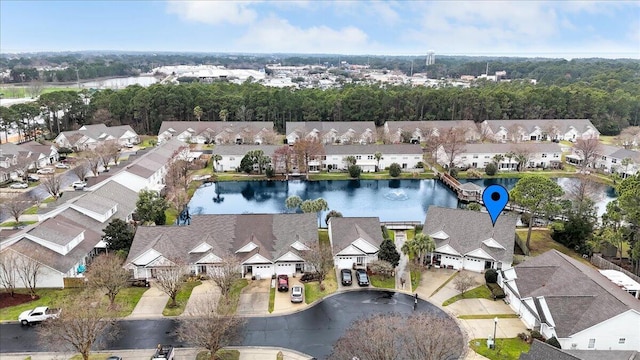 bird's eye view with a water view and a residential view