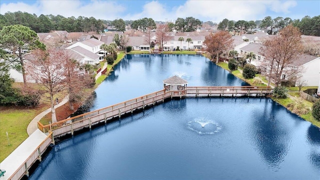 aerial view with a water view and a residential view