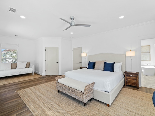 bedroom featuring ornamental molding, wood finished floors, visible vents, and recessed lighting