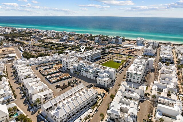 aerial view featuring a water view and a city view