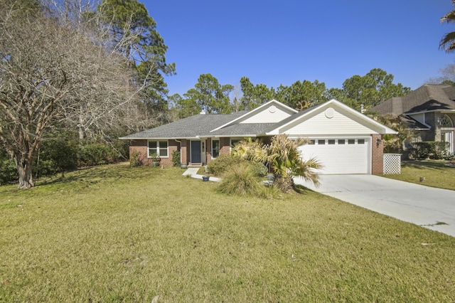 single story home featuring driveway, a garage, a front yard, and brick siding