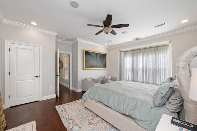 bedroom featuring baseboards, crown molding, visible vents, and dark wood-type flooring