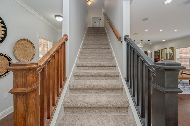 staircase featuring crown molding, recessed lighting, visible vents, wood finished floors, and baseboards