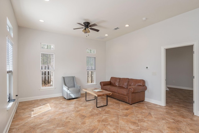 living area with baseboards, a ceiling fan, visible vents, and recessed lighting