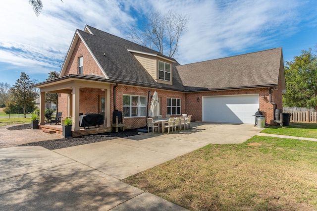 view of front of home with a garage, concrete driveway, brick siding, and roof with shingles