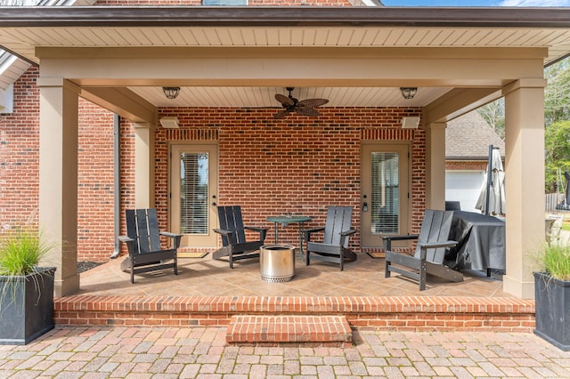 view of patio featuring a ceiling fan