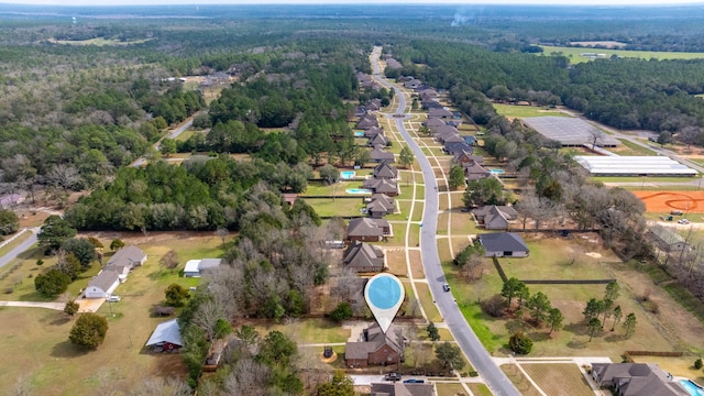 aerial view featuring a residential view and a view of trees