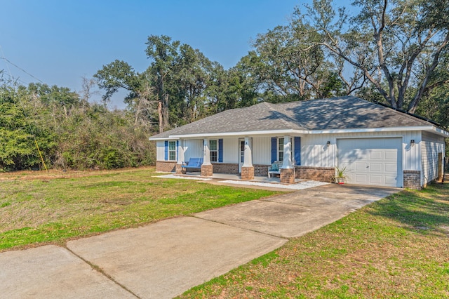 ranch-style house with a front lawn, a garage, and a porch