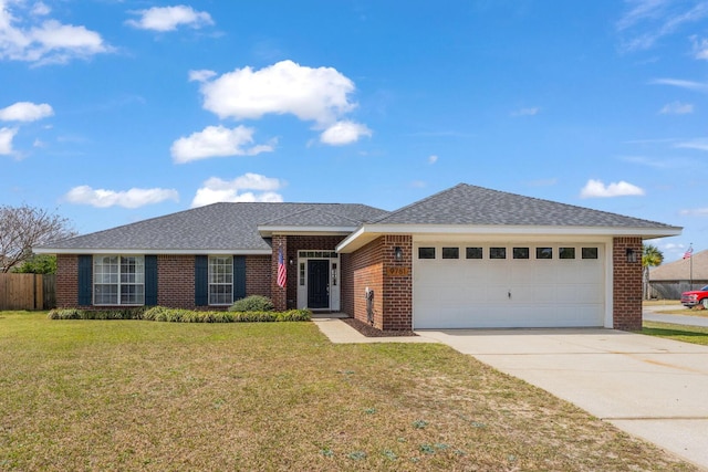 single story home with a garage, a front yard, concrete driveway, and brick siding