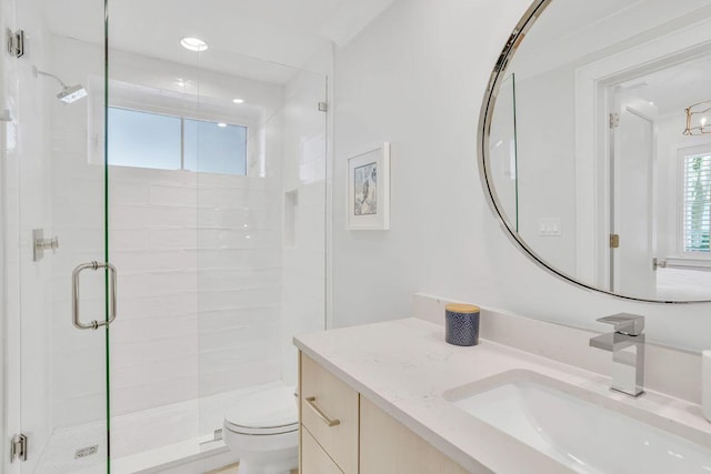 full bath featuring toilet, a shower stall, vanity, and recessed lighting