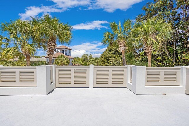 gate featuring a patio