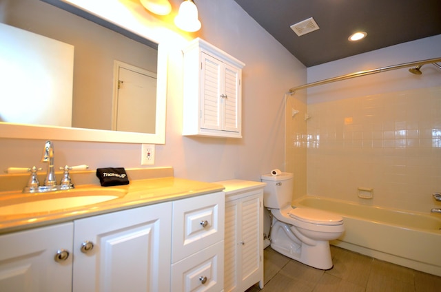 bathroom with bathtub / shower combination, toilet, tile patterned flooring, vanity, and visible vents