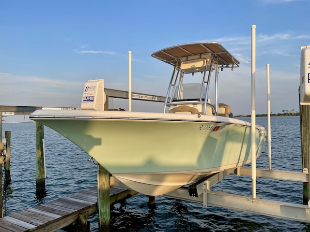 view of dock featuring a water view and boat lift