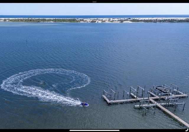 view of water feature with boat lift and a boat dock