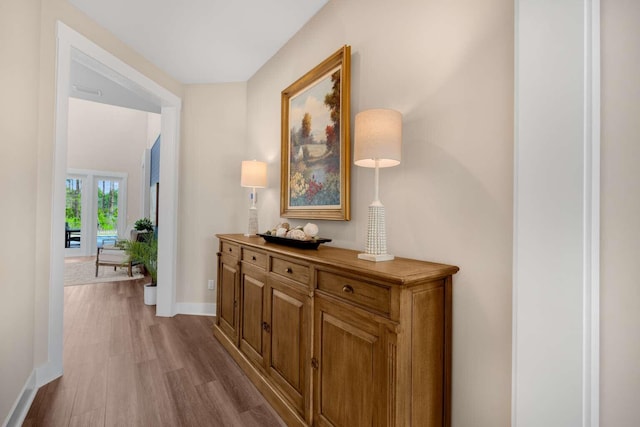 1760 Pathways Dr, Inlet Beach, FL 32461 - corridor featuring baseboards and wood finished floors