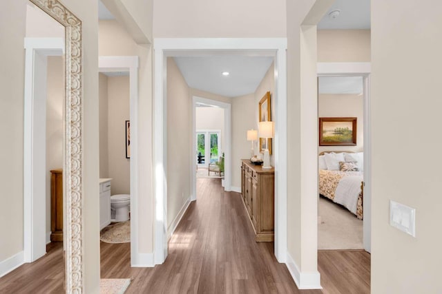 1760 Pathways Dr, Inlet Beach, FL 32461 - hallway with wood finished floors and baseboards
