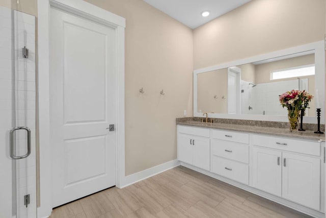 1760 Pathways Dr, Inlet Beach, FL 32461 - full bath featuring double vanity, a stall shower, and baseboards
