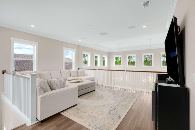 1760 Pathways Dr, Inlet Beach, FL 32461 - living area with healthy amount of natural light, wood finished floors, and recessed lighting