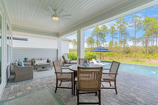 1760 Pathways Dr, Inlet Beach, FL 32461 - fenced backyard featuring a patio area, a ceiling fan, an outdoor hangout area, and outdoor dining space