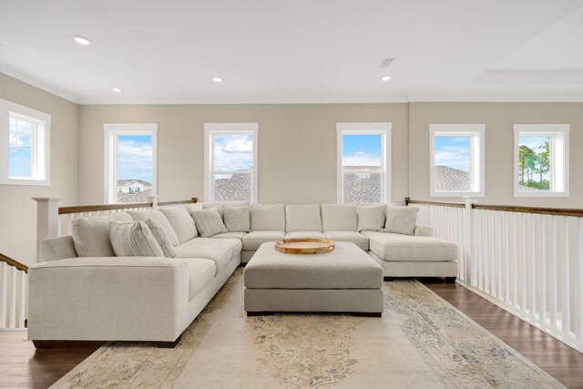 1760 Pathways Dr, Inlet Beach, FL 32461 - living room featuring ornamental molding, plenty of natural light, wood finished floors, and recessed lighting