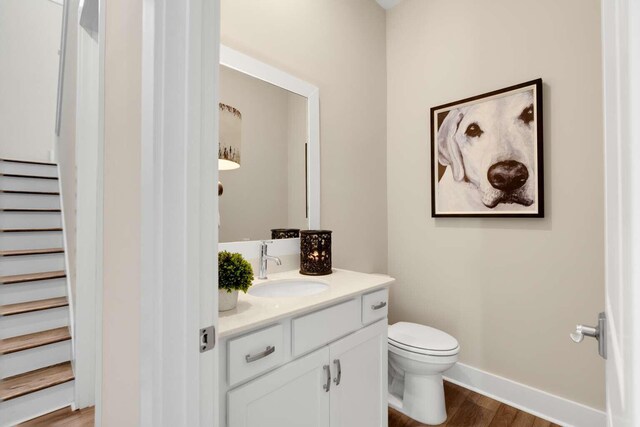 1760 Pathways Dr, Inlet Beach, FL 32461 - half bathroom with vanity and wood finished floors