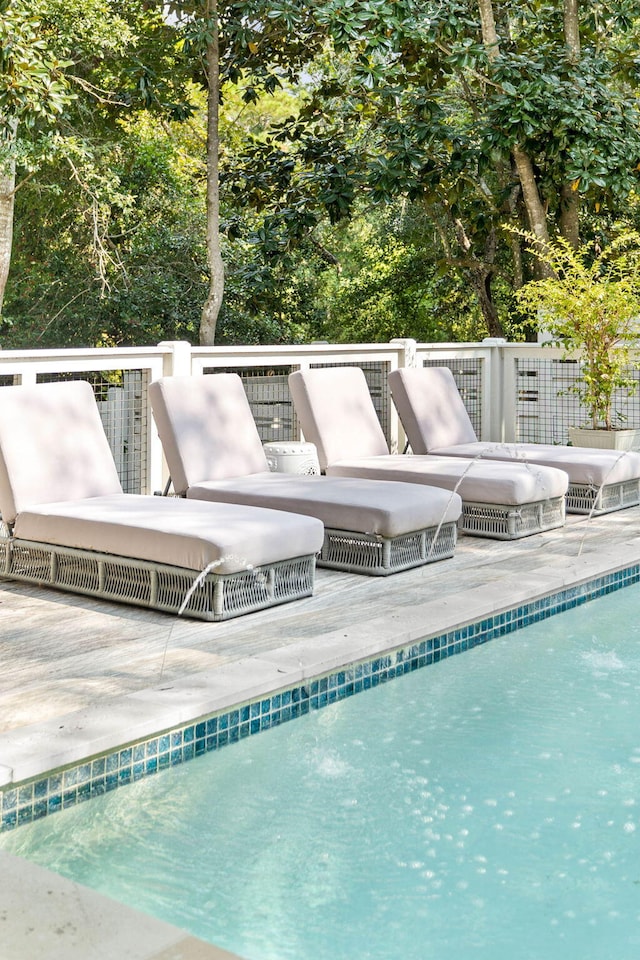 pool with a patio area