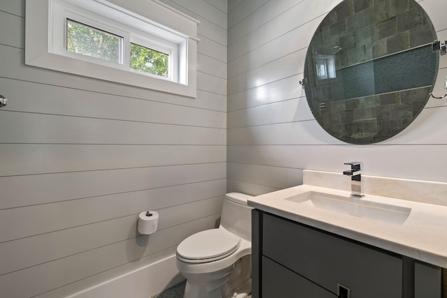 bathroom with toilet and vanity