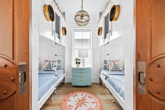 bedroom featuring wood finished floors