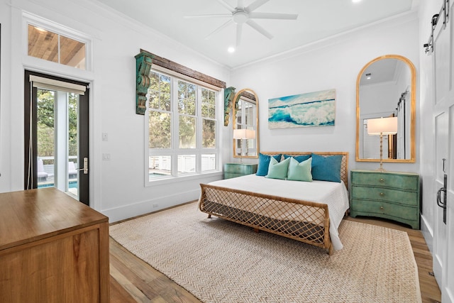 bedroom featuring baseboards, a ceiling fan, ornamental molding, wood finished floors, and access to outside