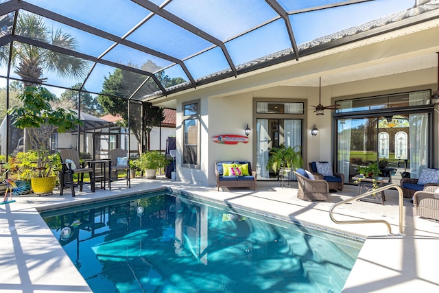 pool featuring a patio area and outdoor lounge area