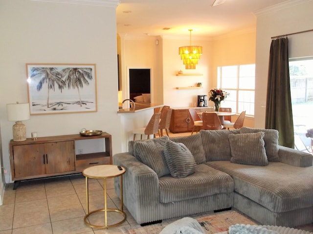 living area with a chandelier, crown molding, and light tile patterned floors