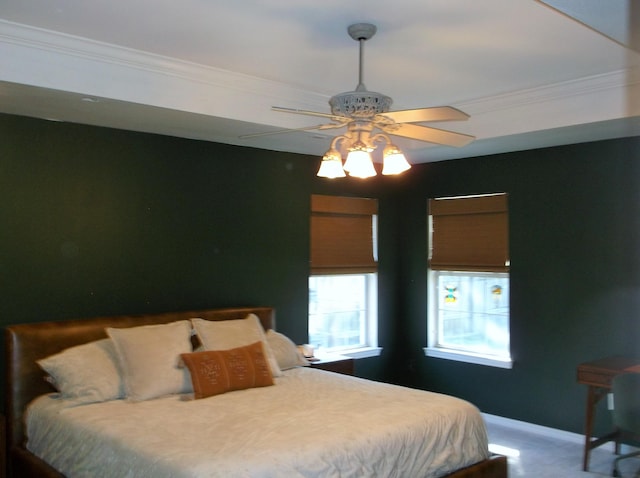 bedroom featuring carpet floors, a ceiling fan, baseboards, and crown molding