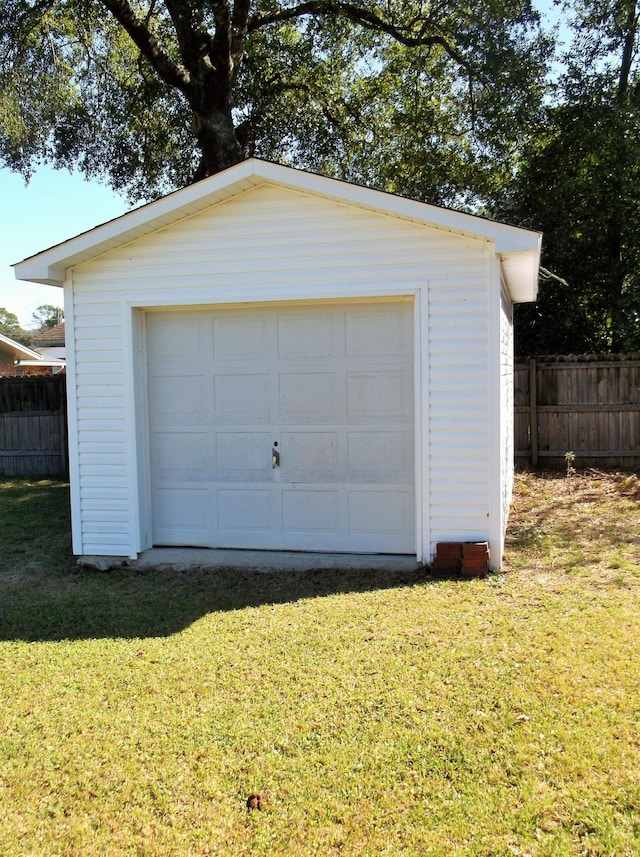 detached garage with fence