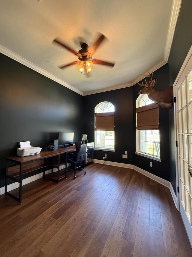 office space with ceiling fan, ornamental molding, dark wood-type flooring, and baseboards