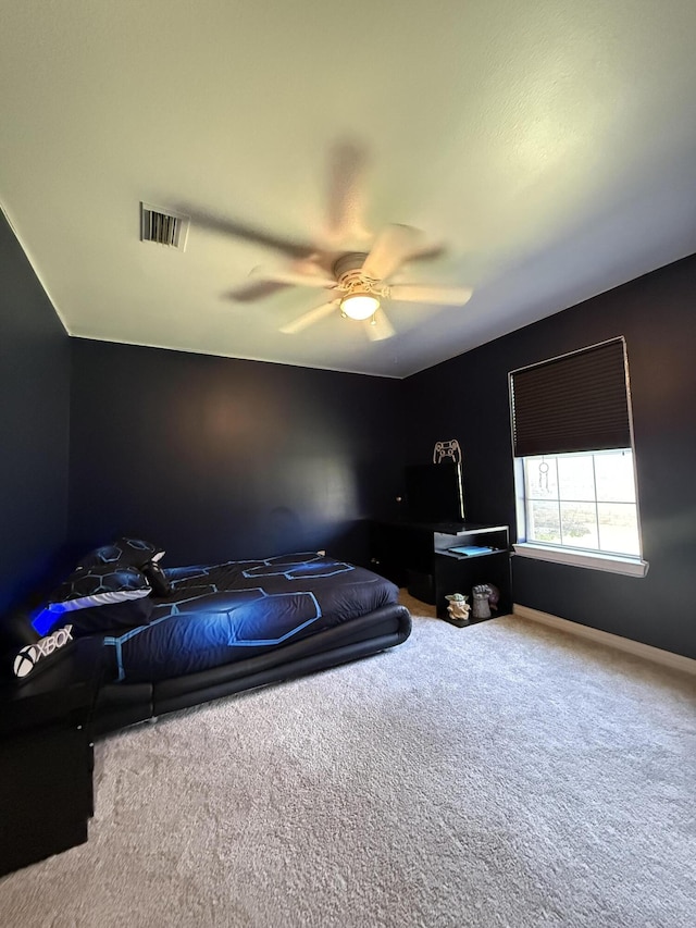 bedroom featuring carpet, visible vents, and ceiling fan