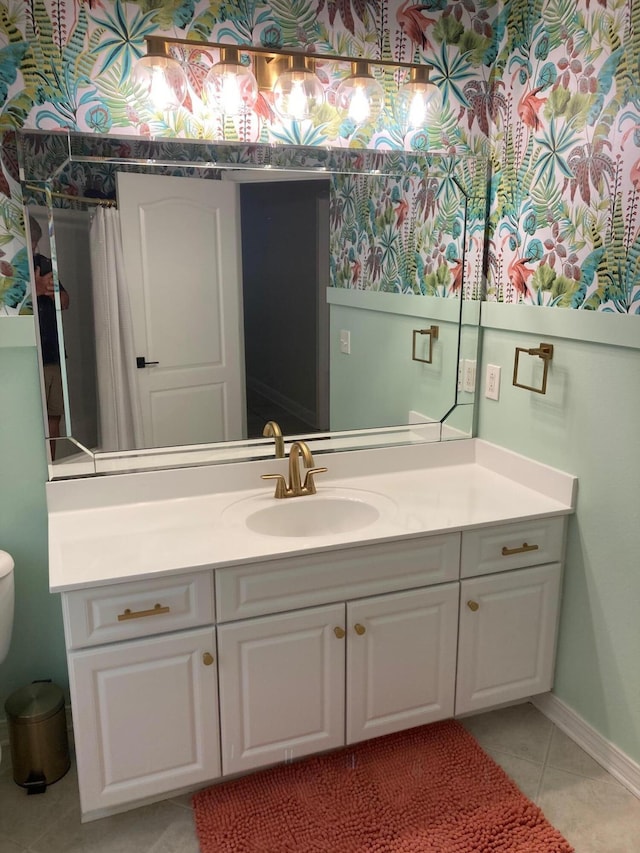 10 Maple Ave, Shalimar, FL 32579 - bathroom featuring vanity, tile patterned floors, and wallpapered walls