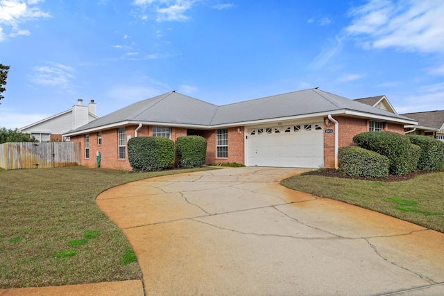 ranch-style house with an attached garage, brick siding, fence, concrete driveway, and a front lawn