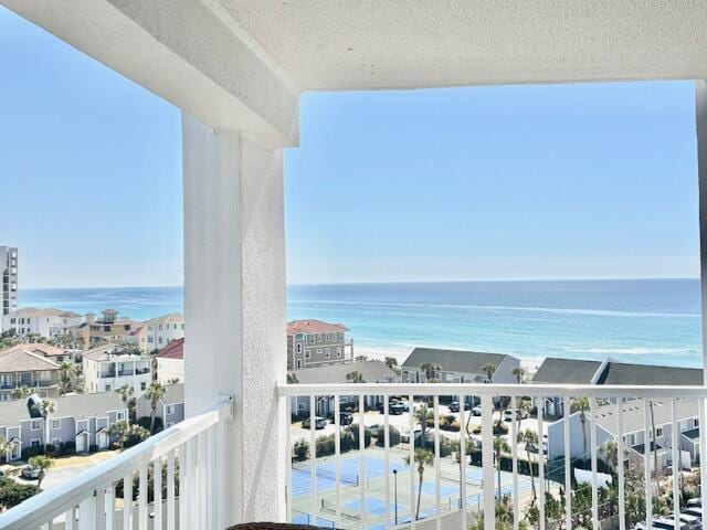 balcony featuring a water view